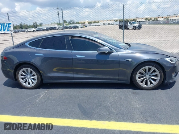 2017 Tesla Model S 60 с VIN 5YJSA1E10HF220006, выставлен на аукционе IAAI как лот 42190629 с пробегом 64 350 миль миль и . История ставок и продаж доступна на DreamBid. Изображение 13.