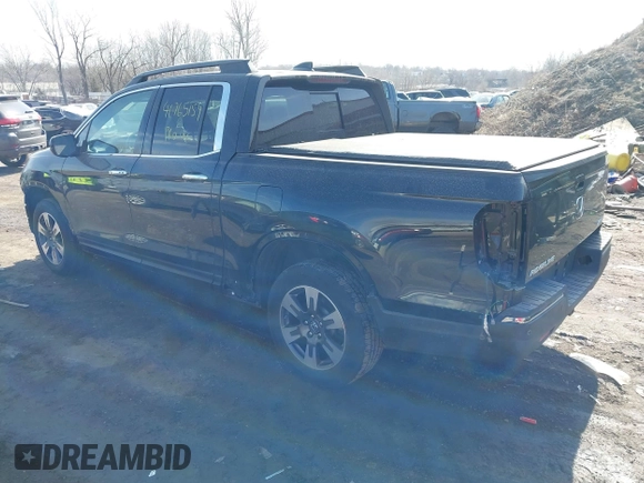2019 Honda Ridgeline RTL-E with VIN 5FPYK3F7XKB014406, listed as a IAAI auction lot 41765154 with 65,209 mi miles and . Bid and sale history available at DreamBid. Image 3.