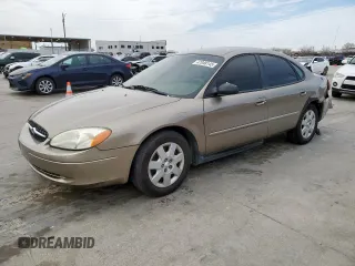 2003 Ford Taurus LX Standard z VIN 1FAFP52U33A131916, wystawiony jako Copart lot #47048145 z przebiegiem 138 712 mil mil oraz Szkoda całkowita • Salvage title. Historia ofert i sprzedaży dostępna na DreamBid. Obrazek 1.