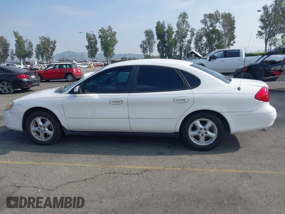 2003 Ford Taurus SES Standard with VIN 1FAFP55293G176494, listed as a IAAI auction lot 42040985 with 95,550 mi miles. Bid and sale history available at carsss.com. Image 14.