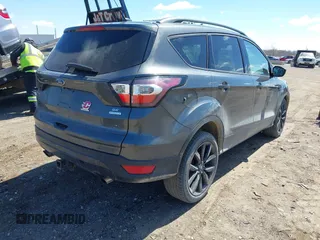 2017 Ford Escape SE with VIN 1FMCU0G92HUF10596, listed as a IAAI auction lot 42038215 with 145,735 mi miles. Bid and sale history available at carsss.com. Image 4.