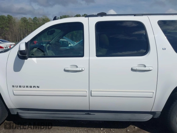 2011 Chevrolet Suburban LT with VIN 1GNSCJE01BR291466, listed as a IAAI auction lot 41800799 with 232,542 mi miles. Bid and sale history available at carsss.com. Image 14.