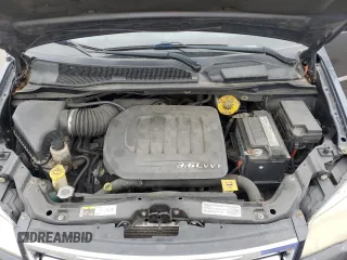 2014 Chrysler Town & Country Touring z VIN 2C4RC1BGXER311026, wystawiony jako Copart lot #57581375 z przebiegiem 84 725 mil mil oraz Szkoda całkowita • Salvage title. Historia ofert i sprzedaży dostępna na DreamBid. Obrazek 11.