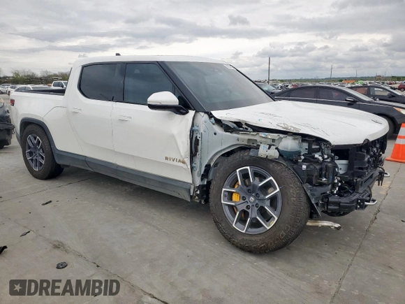 2022 Rivian R1T Adventure z VIN 7FCTGAAA8NN013508, wystawiony jako Copart lot #50834485 z przebiegiem Nie podano mil oraz Szkody całkowita. Historia ofert i sprzedaży dostępna na DreamBid. Obrazek 4.