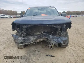 2020 Chevrolet Silverado 1500 Custom with VIN 1GCRWBEK1LZ225099, listed as a Copart auction lot 84474384 with 104,928 mi miles and Salvage Title. Bid and sale history available at carsss.com. Image 5.