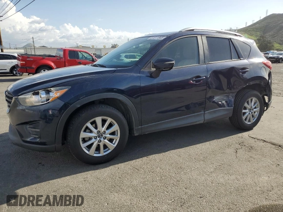 2016 Mazda CX-5 Sport with VIN JM3KE2BY0G0730906, listed as a Copart auction lot 51611865 with 207,166 mi miles and Salvage Title. Bid and sale history available at carsss.com. Image 1.