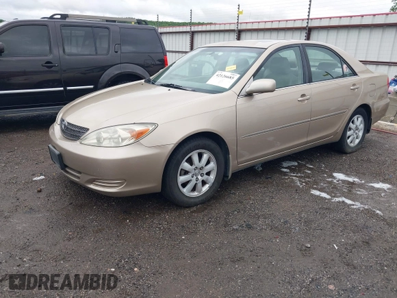 2002 Toyota Camry LE z VIN 4T1BE32K52U086150, wystawiony jako IAAI lot #42126685 z przebiegiem 175 212 mil mil oraz . Historia ofert i sprzedaży dostępna na DreamBid. Obrazek 2.