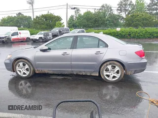 2006 Acura RL z VIN JH4KB16516C012532, wystawiony jako IAAI lot #42095836 z przebiegiem 177 194 mil mil oraz . Historia ofert i sprzedaży dostępna na DreamBid. Obrazek 15.