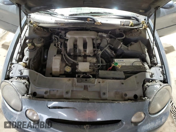 1999 Ford Taurus SE z VIN 1FAFP58S0XG301691, wystawiony jako Copart lot #81920424 z przebiegiem 203 931 mil mil oraz Szkoda całkowita • Salvage title. Historia ofert i sprzedaży dostępna na DreamBid. Obrazek 11.