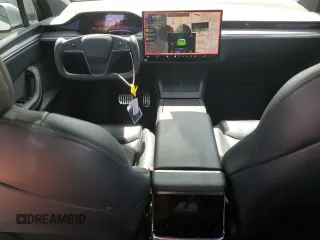 2022 Tesla Model X with VIN 7SAXCBE52NF362994, listed as a Copart auction lot 49850475 with 55,506 mi miles and Salvage Title. Bid and sale history available at DreamBid. Image 8.