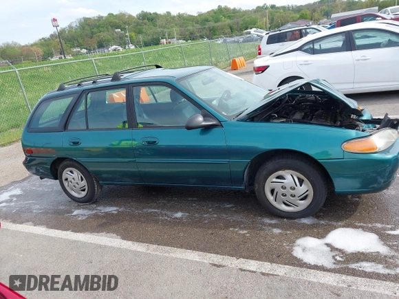 1997 Ford Escort LX with VIN 3FALP15P1VR169817, listed as a IAAI auction lot 42094673 with 111,762 mi miles. Bid and sale history available at carsss.com. Image 13.