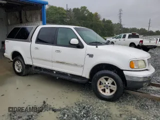 2002 Ford F-150 XLT with VIN 1FTRW08692KE20555, listed as a Copart auction lot 73571414 with 166,288 mi miles and Clean Title. Bid and sale history available at carsss.com. Image 4.