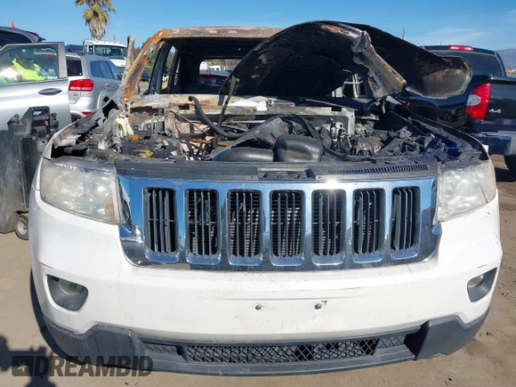 2011 Jeep Grand Cherokee Laredo with VIN 1J4RS4GG2BC618072, listed as a IAAI auction lot 38619850 with Not Provided miles and . Bid and sale history available at DreamBid. Image 11.