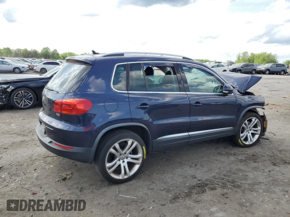 2016 Volkswagen Tiguan SEL with VIN WVGAV7AXXGW555809, listed as a Copart auction lot 55177805 with 40,676 mi miles and Salvage Title. Bid and sale history available at DreamBid. Image 3.