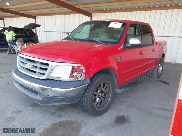 2001 Ford F-150 SuperCrew XLT with VIN 1FTRW07W61KB16745, listed as a IAAI auction lot 42001221 with 260,200 mi miles. Bid and sale history available at carsss.com. Image 17.