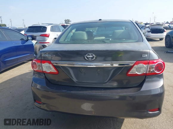 2011 Toyota Corolla L with VIN JTDBU4EE3BJ090749, listed as a IAAI auction lot 42106633 with 209,824 mi miles. Bid and sale history available at carsss.com. Image 17.