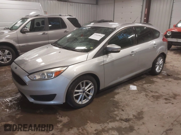 2015 Ford Focus SE with VIN 1FADP3K29FL328611, listed as a IAAI auction lot 41669844 with 136,666 mi miles. Bid and sale history available at carsss.com. Image 2.