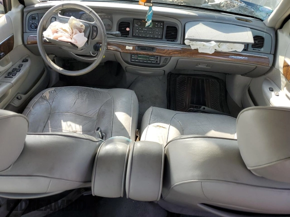 1999 Mercury Grand Marquis LS z VIN 2MEFM75W1XX635839, wystawiony jako Copart lot #55860735 z przebiegiem 114 963 mil mil oraz Szkoda całkowita • Salvage title. Historia ofert i sprzedaży dostępna na DreamBid. Obrazek 8.