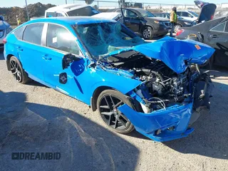 2024 Honda Civic Sport Touring z VIN 19XFL1G80RE001317, wystawiony jako IAAI lot #41246635 z przebiegiem 20 422 mil mil oraz . Historia ofert i sprzedaży dostępna na DreamBid. Obrazek 1.