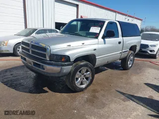 1998 Dodge Ram 1500 with VIN 1B7HF16Y2WS556490, listed as a IAAI auction lot 41734400 with 218,082 mi miles. Bid and sale history available at carsss.com. Image 2.