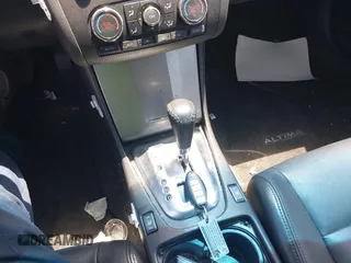2012 Nissan Altima SR z VIN 1N4BL2AP3CN550765, wystawiony jako IAAI lot #42346648 z przebiegiem 27 913 mil mil oraz . Historia ofert i sprzedaży dostępna na DreamBid. Obrazek 11.