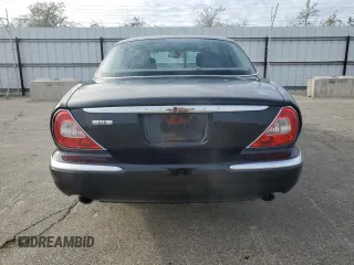 2004 Jaguar XJ with VIN SAJEA71C94SG11566, listed as a Copart auction lot 85281684 with 107,054 mi miles and Clean Title. Bid and sale history available at carsss.com. Image 6.