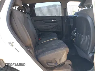 2019 Hyundai Santa Fe SE z VIN 5NMS23AD7KH058499, wystawiony jako IAAI lot #41963798 z przebiegiem Nie podano mil oraz . Historia ofert i sprzedaży dostępna na DreamBid. Obrazek 8.