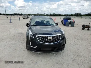 2021 Cadillac XT5 FWD Premium Luxury with VIN 1GYKNCRS0MZ100515, listed as a Copart auction lot 62856785 with 50,298 mi miles and Salvage title. Bid and sale history available at DreamBid. Image 14.