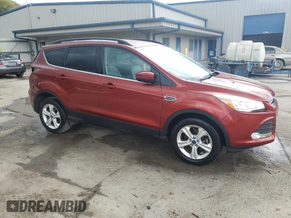 2015 Ford Escape SE with VIN 1FMCU9GX2FUB47068, listed as a Copart auction lot 54772975 with 97,348 mi miles and Salvage Title. Bid and sale history available at DreamBid. Image 4.