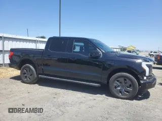2023 Ford F-150 Lightning Pro with VIN 1FTVW1EV1PWG17333, listed as a Copart auction lot 57904025 with 21,173 mi miles and Salvage title. Bid and sale history available at DreamBid. Image 4.
