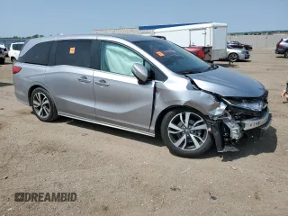 2022 Honda Odyssey Touring с VIN 5FNRL6H85NB056617, выставлен на аукционе Copart как лот 59208295 с пробегом 26 000 миль миль и Списание • Salvage title. История ставок и продаж доступна на DreamBid. Изображение 4.