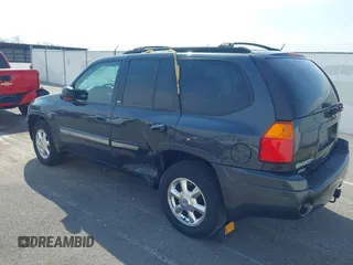 2005 GMC Envoy SLE with VIN 1GKDT13S052299632, listed as a IAAI auction lot 41966628 with 199,312 mi miles and . Bid and sale history available at DreamBid. Image 3.