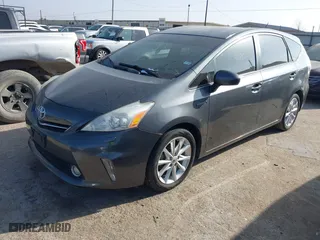2014 Toyota Prius v Two with VIN JTDZN3EU5E3311130, listed as a IAAI auction lot 41781548 with 63,889 mi miles. Bid and sale history available at carsss.com. Image 18.