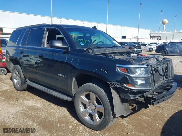 2017 Chevrolet Tahoe LS with VIN 1GNSCAKC8HR360581, listed as a IAAI auction lot 41365169 with 137,369 mi miles. Bid and sale history available at carsss.com. Image 1.