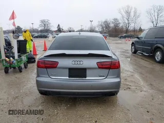 2016 Audi A6 2.0T Premium Plus with VIN WAUGFAFC1GN014536, listed as a IAAI auction lot 41937616 with 122,417 mi miles. Bid and sale history available at carsss.com. Image 16.