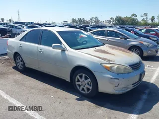 2004 Toyota Camry LE with VIN 4T1BE32K84U341747, listed as a IAAI auction lot 42701813 with 245,431 mi miles and . Bid and sale history available at DreamBid. Image 1.