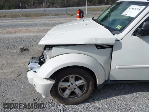 2007 Dodge Nitro SXT with VIN 1D8GU28K77W727391, listed as a IAAI auction lot 41869288 with 214,920 mi miles. Bid and sale history available at carsss.com. Image 19.