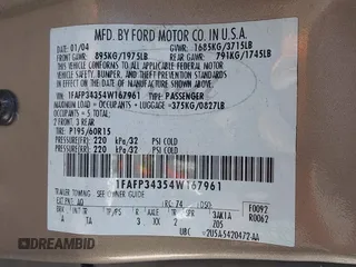2004 Ford Focus SE with VIN 1FAFP34354W167961, listed as a IAAI auction lot 41545304 with 128,560 mi miles and . Bid and sale history available at DreamBid. Image 9.