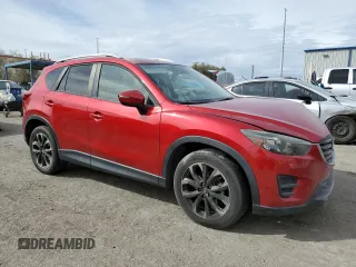 2016 Mazda CX-5 Grand Touring with VIN JM3KE4DY0G0820954, listed as a Copart auction lot 48027785 with 152,448 mi miles and Salvage Title. Bid and sale history available at carsss.com. Image 4.