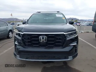 2024 Honda Pilot Touring z VIN 5FNYG1H70RB032368, wystawiony jako IAAI lot #41805758 z przebiegiem 13 078 mil mil oraz . Historia ofert i sprzedaży dostępna na DreamBid. Obrazek 12.