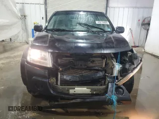 2011 Suzuki Grand Vitara Premium with VIN JS3TD0D28B4102673, listed as a Copart auction lot 43216005 with 141,726 mi miles and Salvage title. Bid and sale history available at DreamBid. Image 5.