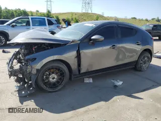 2020 Mazda 3 with VIN JM1BPBLM9L1169737, listed as a Copart auction lot 60710075 with 36,853 mi miles and Salvage title. Bid and sale history available at DreamBid. Image 1.