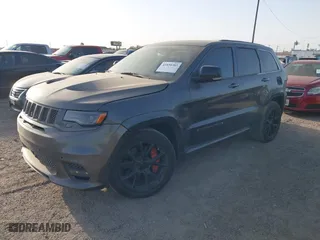 2015 Jeep Grand Cherokee SRT with VIN 1C4RJFDJ9FC842448, listed as a IAAI auction lot 41850385 with 178,439 mi miles. Bid and sale history available at carsss.com. Image 17.