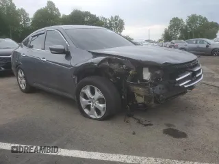 2012 Honda Crosstour EX-L z VIN 5J6TF1H5XCL001140, wystawiony jako Copart lot #58998445 z przebiegiem 244 410 mil mil oraz Szkoda całkowita • Salvage title. Historia ofert i sprzedaży dostępna na DreamBid. Obrazek 4.