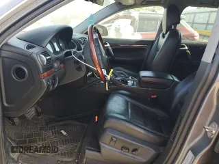 2005 Porsche Cayenne z VIN WP1AA29P65LA23655, wystawiony jako Copart lot #55174175 z przebiegiem 153 837 mil mil oraz Szkoda całkowita • Salvage title. Historia ofert i sprzedaży dostępna na DreamBid. Obrazek 7.