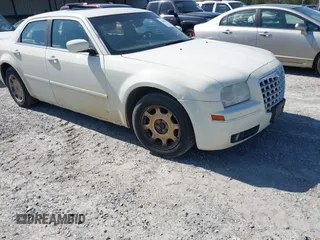 2005 Chrysler 300 Touring with VIN 2C3AA53G45H552972, listed as a IAAI auction lot 41996998 with 297,276 mi miles and . Bid and sale history available at DreamBid. Image 1.