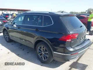2024 Volkswagen Tiguan SE with VIN 3VV3B7AX5RM027024, listed as a IAAI auction lot 41801265 with 8,101 mi miles and . Bid and sale history available at DreamBid. Image 3.