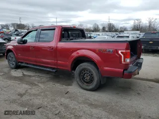 2015 Ford F-150 XLT w/HD Payload Pkg with VIN 1FTFW1EG9FFA35744, listed as a Copart auction lot 51133275 with 128,006 mi miles and Salvage Title. Bid and sale history available at carsss.com. Image 2.