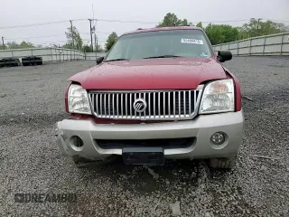 2002 Mercury Mountaineer z VIN 4M2ZU86W82UJ34069, wystawiony jako Copart lot #55499815 z przebiegiem 157 492 mil mil oraz Szkody całkowita. Historia ofert i sprzedaży dostępna na DreamBid. Obrazek 14.
