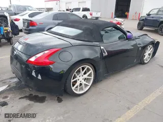 2010 Nissan 370Z Touring with VIN JN1AZ4FH3AM302412, listed as a IAAI auction lot 41290785 with 112,330 mi miles. Bid and sale history available at carsss.com. Image 4.
